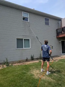Clean Stream Pro Wash technician soft washing home siding